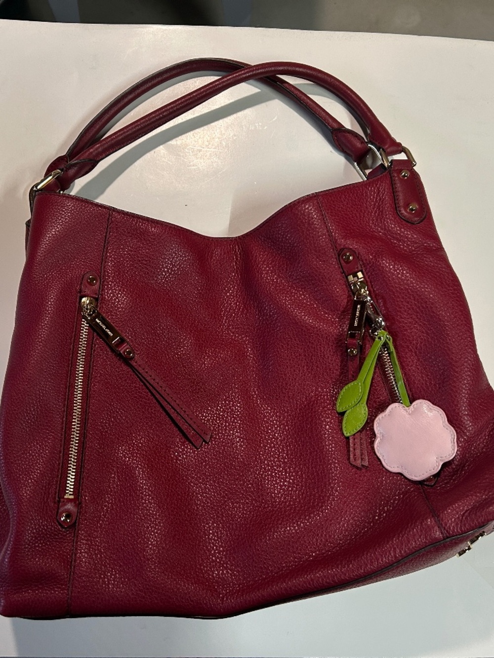 Women's burgundy Michael Kors handbag and wallet